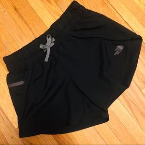 Black workout shorts by The North Face, Size XS